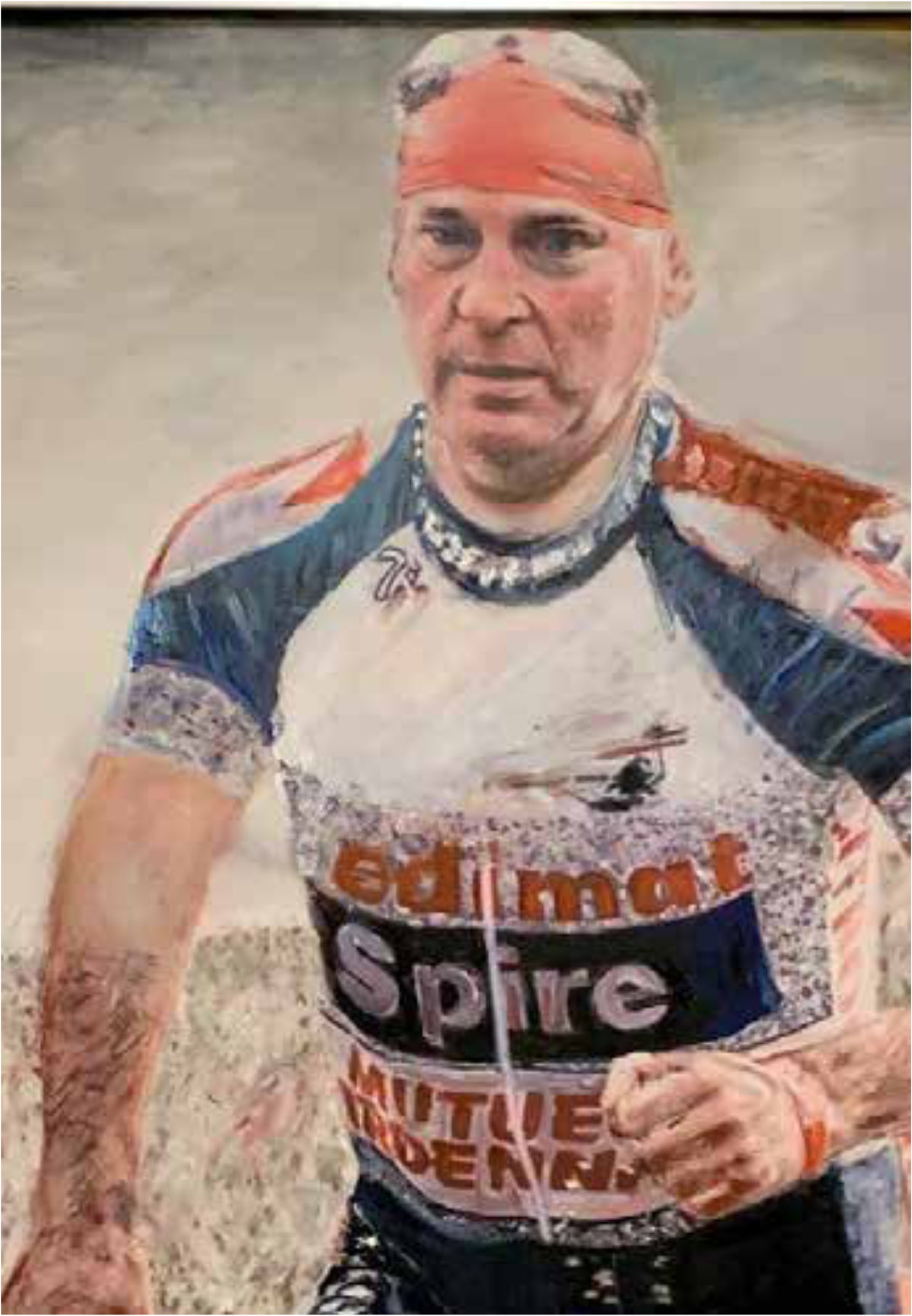 Obraz, na którym znajduje się Krzysztof Badowski w trakcie triathlonu.